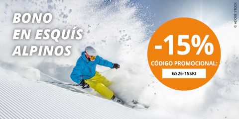Un esquiador con chaqueta azul y pantalones amarillos baja por una pista nevada. El texto dice: "BONO EN ESQUÍS ALPINOS" y "-15% CÓDIGO PROMOCIONAL: GS25-15SKI" en un círculo naranja.