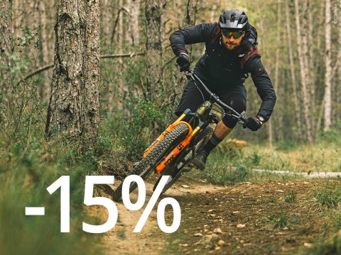 Fondo naranja con texto blanco "BONUS de -15% en BICICLETAS y E-BIKES*.