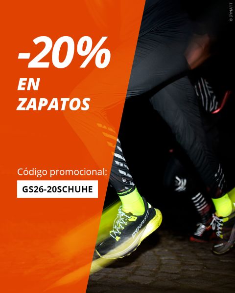 Corredor con zapatillas de neón por la noche con una pancarta naranja que ofrece un 20% de descuento en zapatillas y un código promocional: GS26-20ZAPATILLAS.